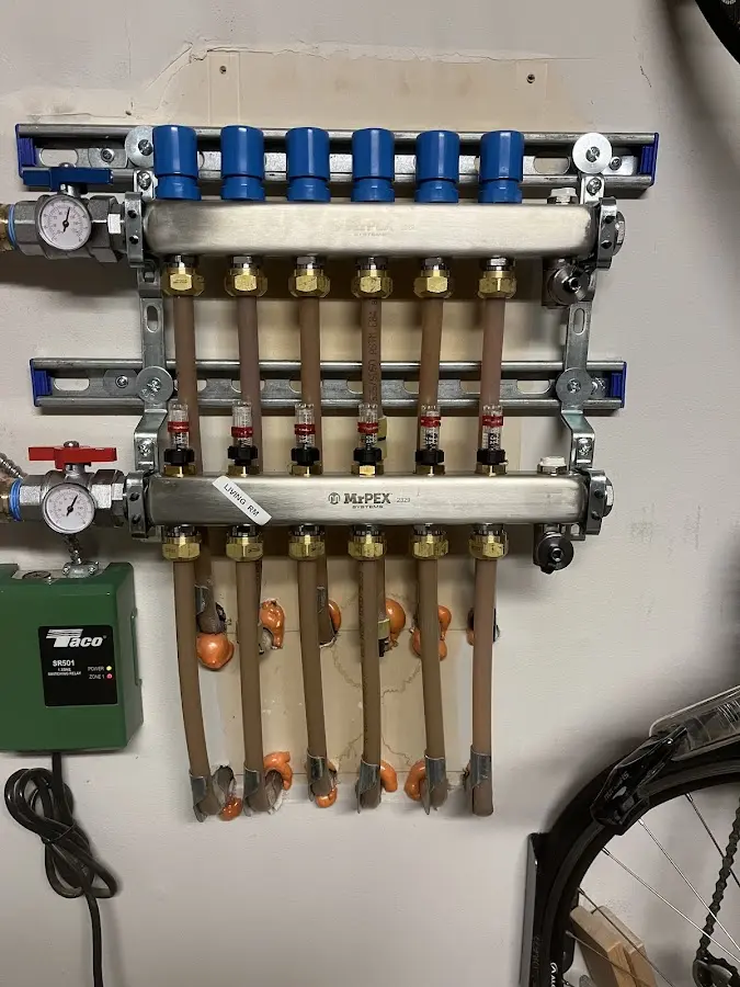 Plumber performing Leak Detection at a residential property in Dundee